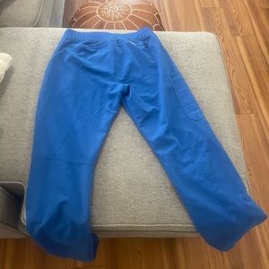 Figs size tall small scrubs. have been worn and loved, in good used condition.